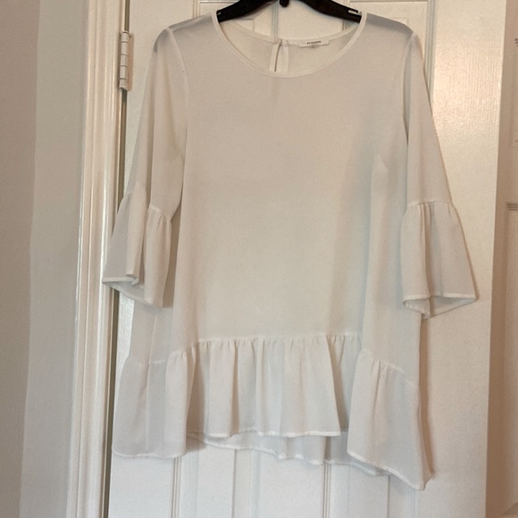 Pleione Tops - Cream blouse with flounce on sleeves and hem